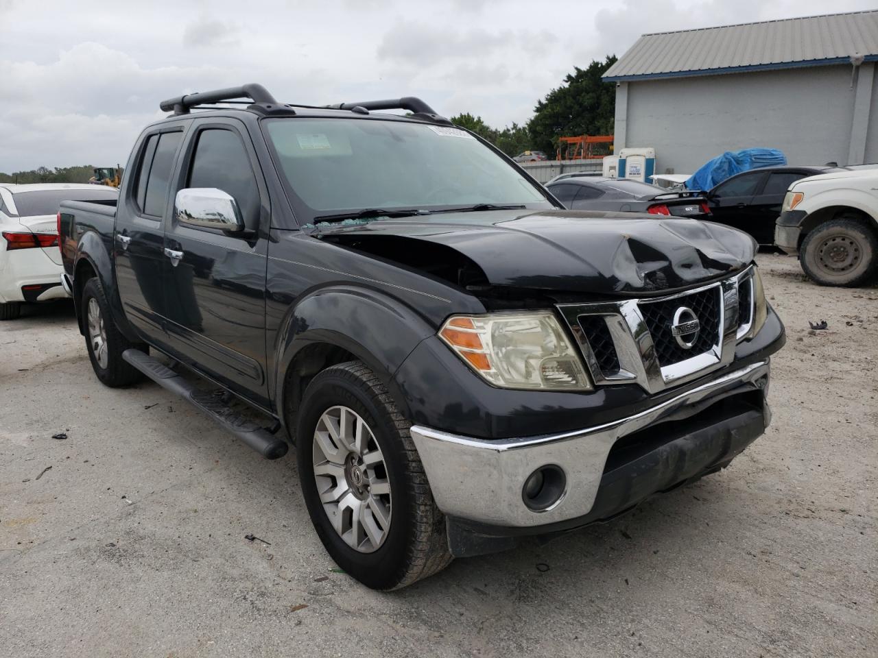 NISSAN FRONTIER S 2011 with VIN 1N6AD0ER8BC410852 - Photo from auction