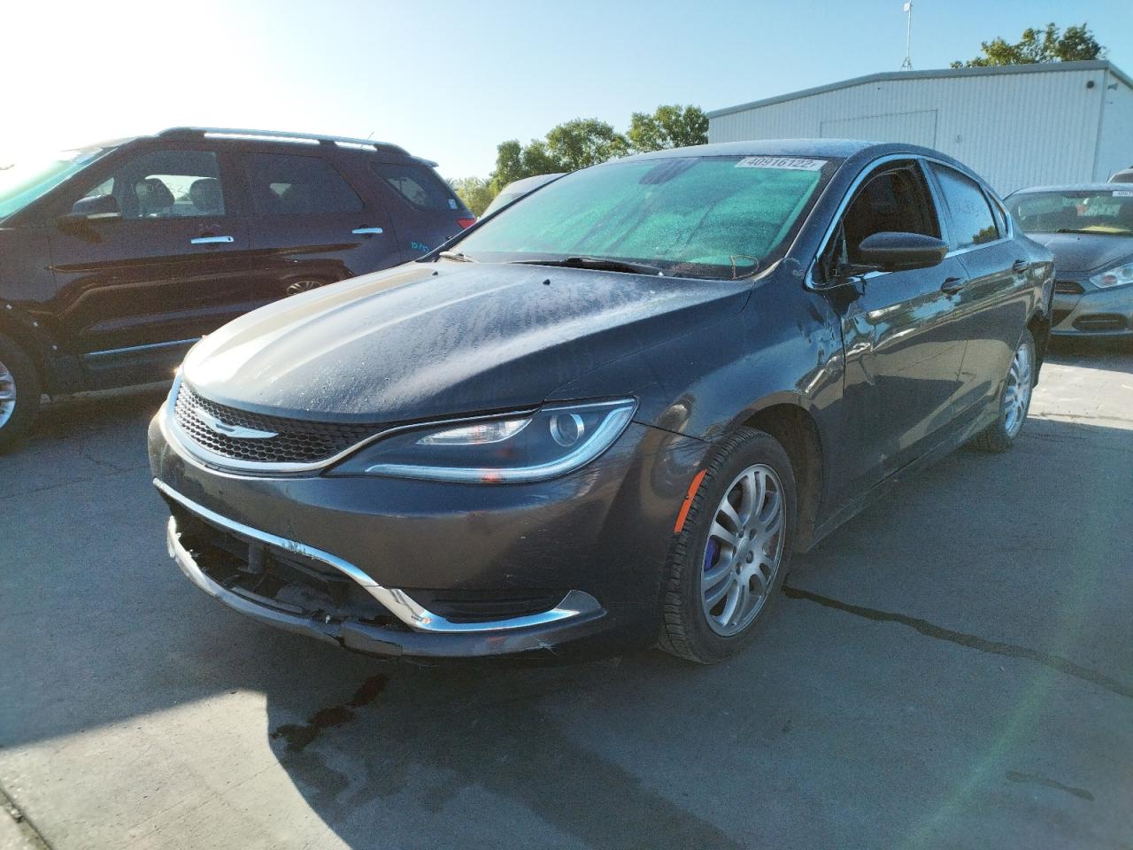Photo 2 from auction – 2015 CHRYSLER 200 LIMITE with VIN 1C3CCCAB8FN747061