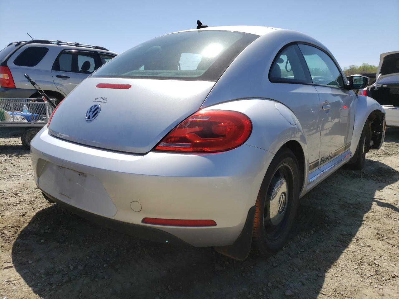 Photo 4 from auction – 2014 VOLKSWAGEN BEETLE with VIN 3VWJP7AT7EM614823