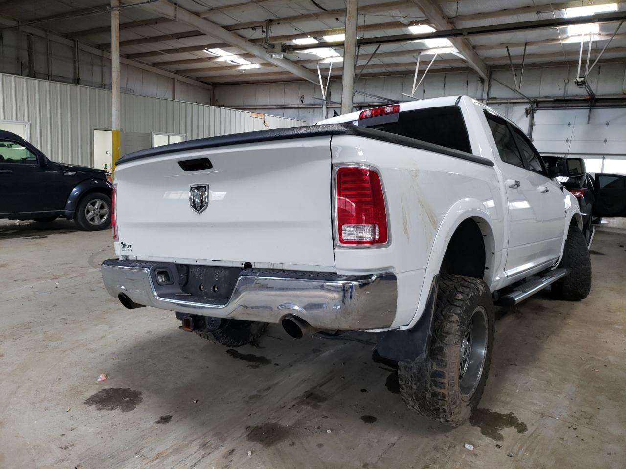 Photo 4 from auction – 2014 RAM 1500 LARAM with VIN 1C6RR7NT4ES266004