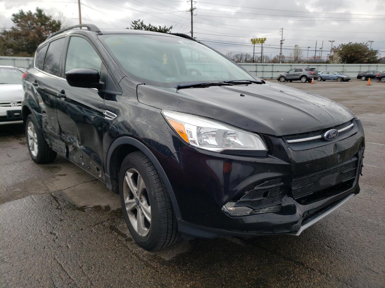 Photo 1 from auction – 2016 FORD ESCAPE SE with VIN 1FMCU0GXXGUC40594