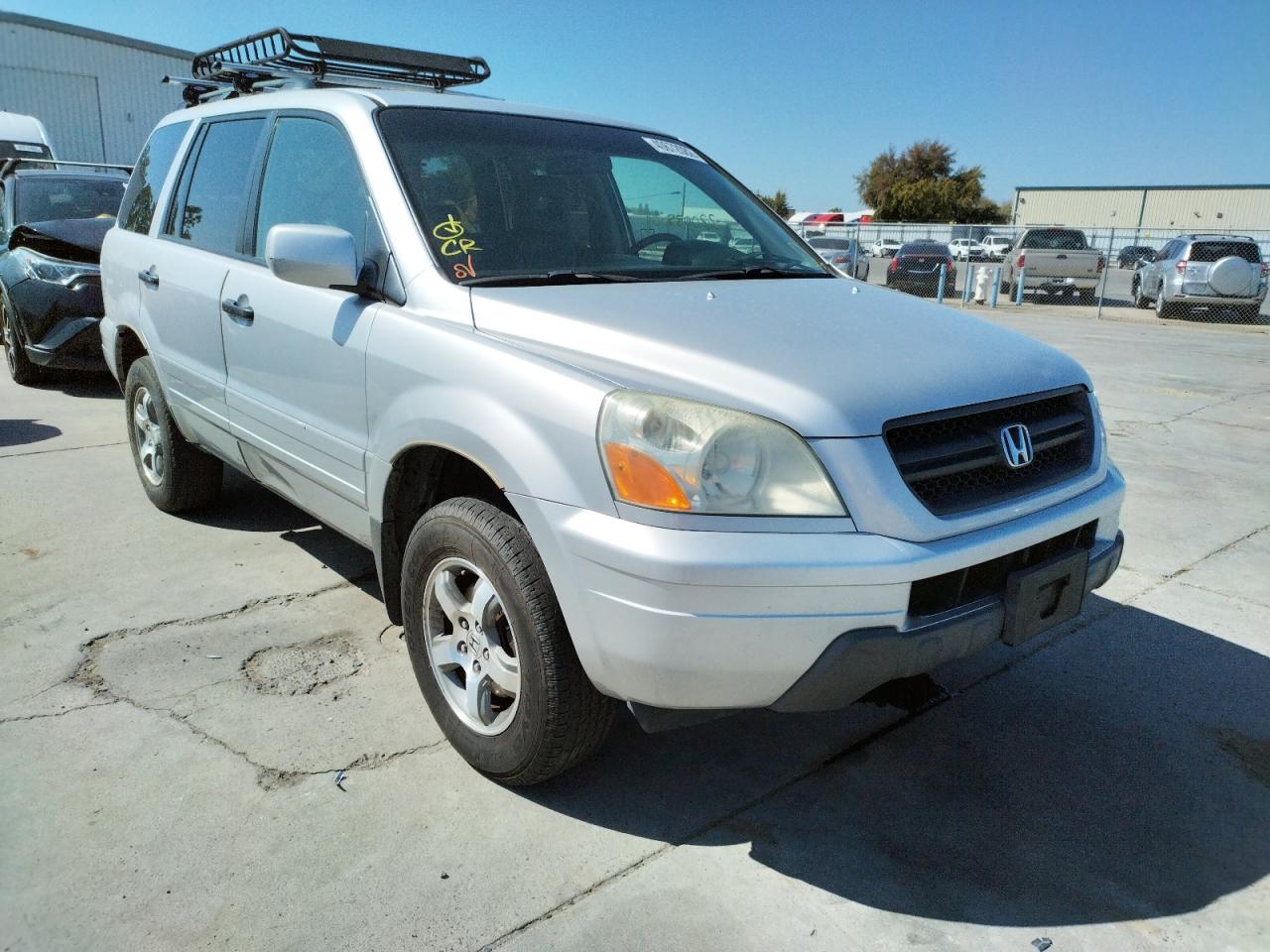 HONDA PILOT EXL 2004 with VIN 2HKYF18614H502945 - Photo from auction