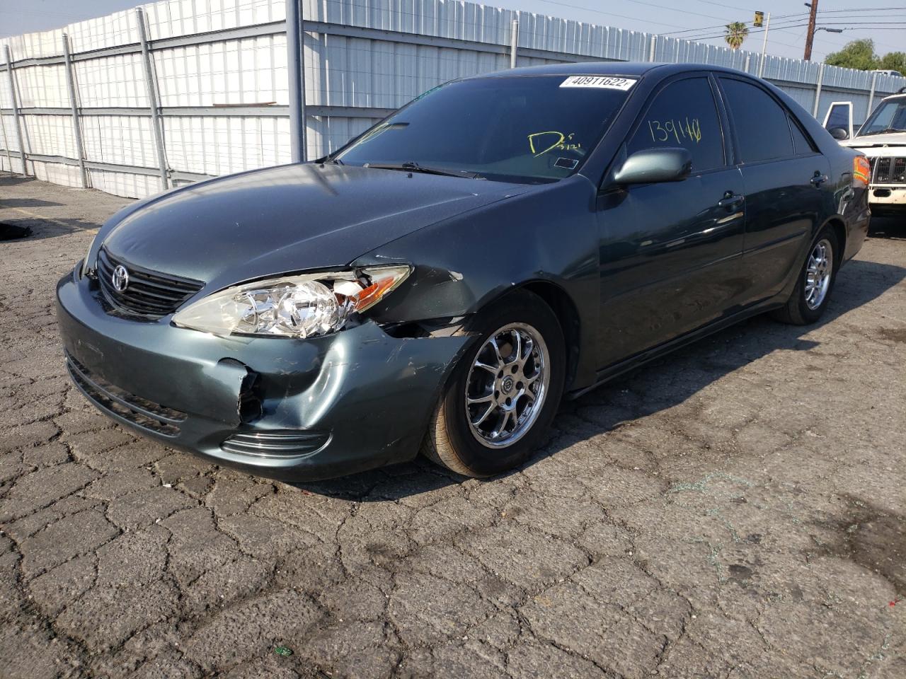 Photo 2 from auction – 2002 TOYOTA CAMRY LE with VIN 4T1BF30K72U500819