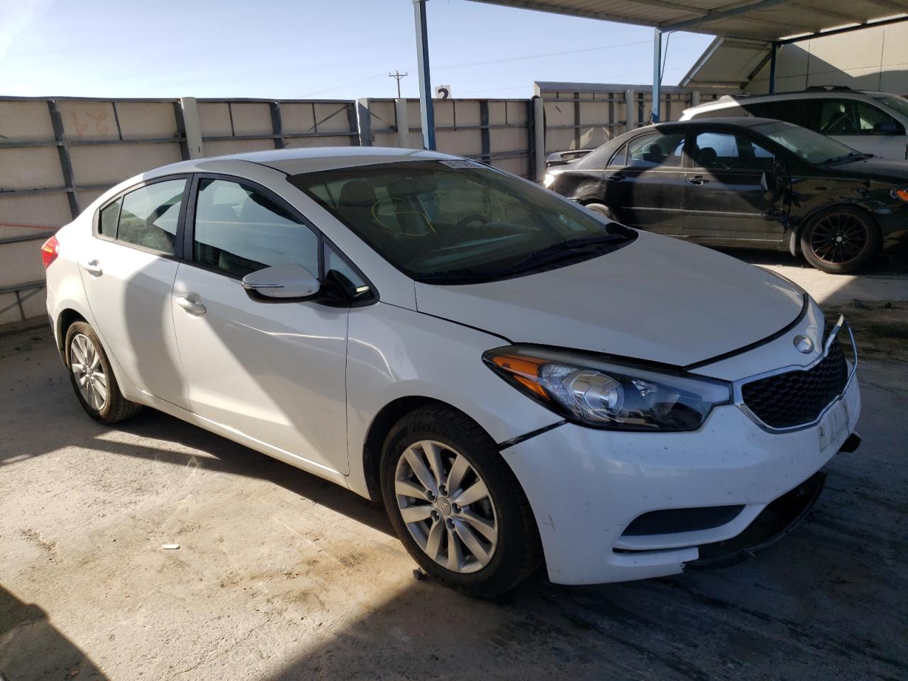 KIA FORTE LX 2014 with VIN KNAFX4A64E5094973 - Photo from auction