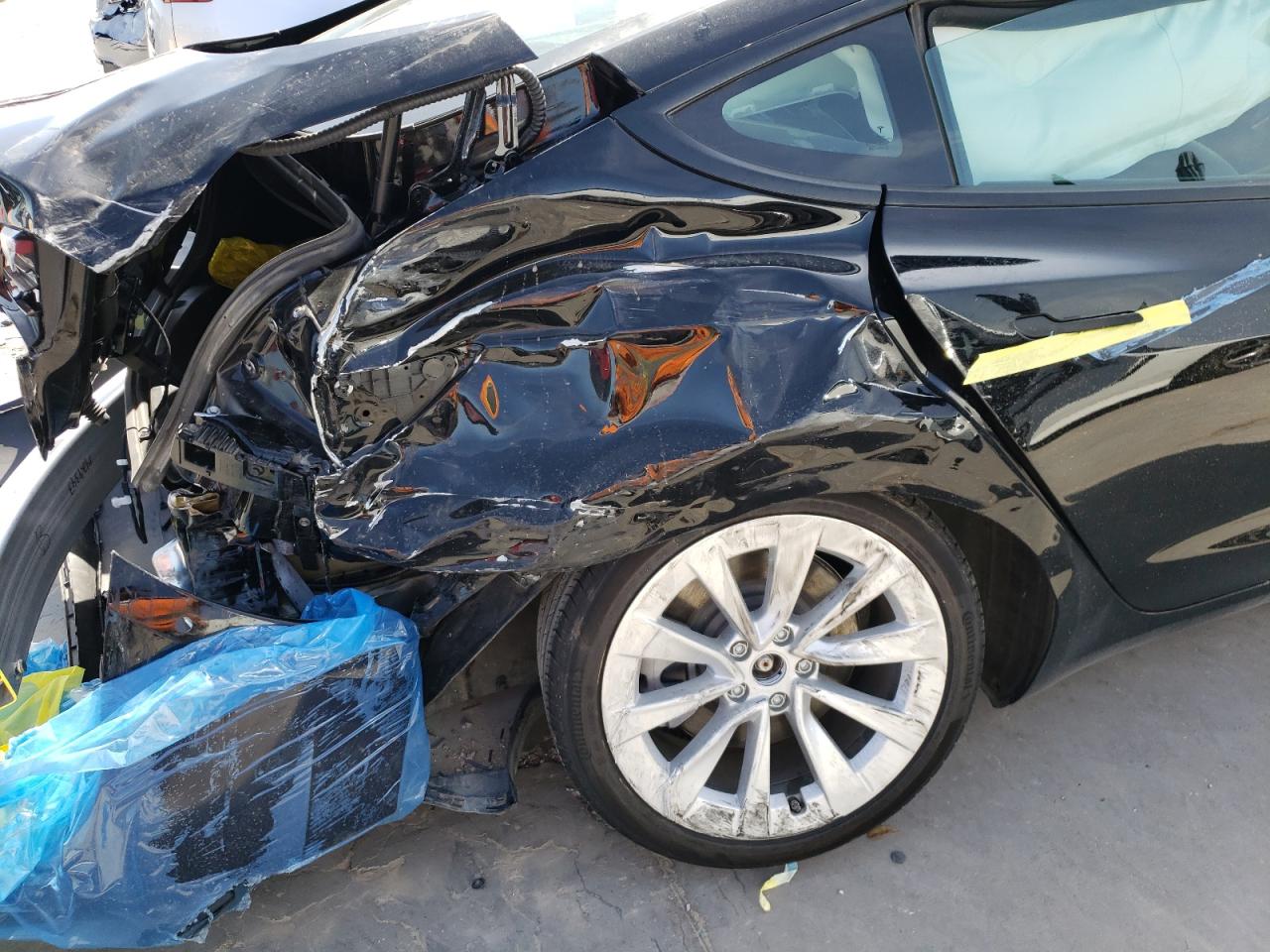 Photo 9 from auction – 2021 TESLA MODEL 3 with VIN 5YJ3E1EAXMF918576