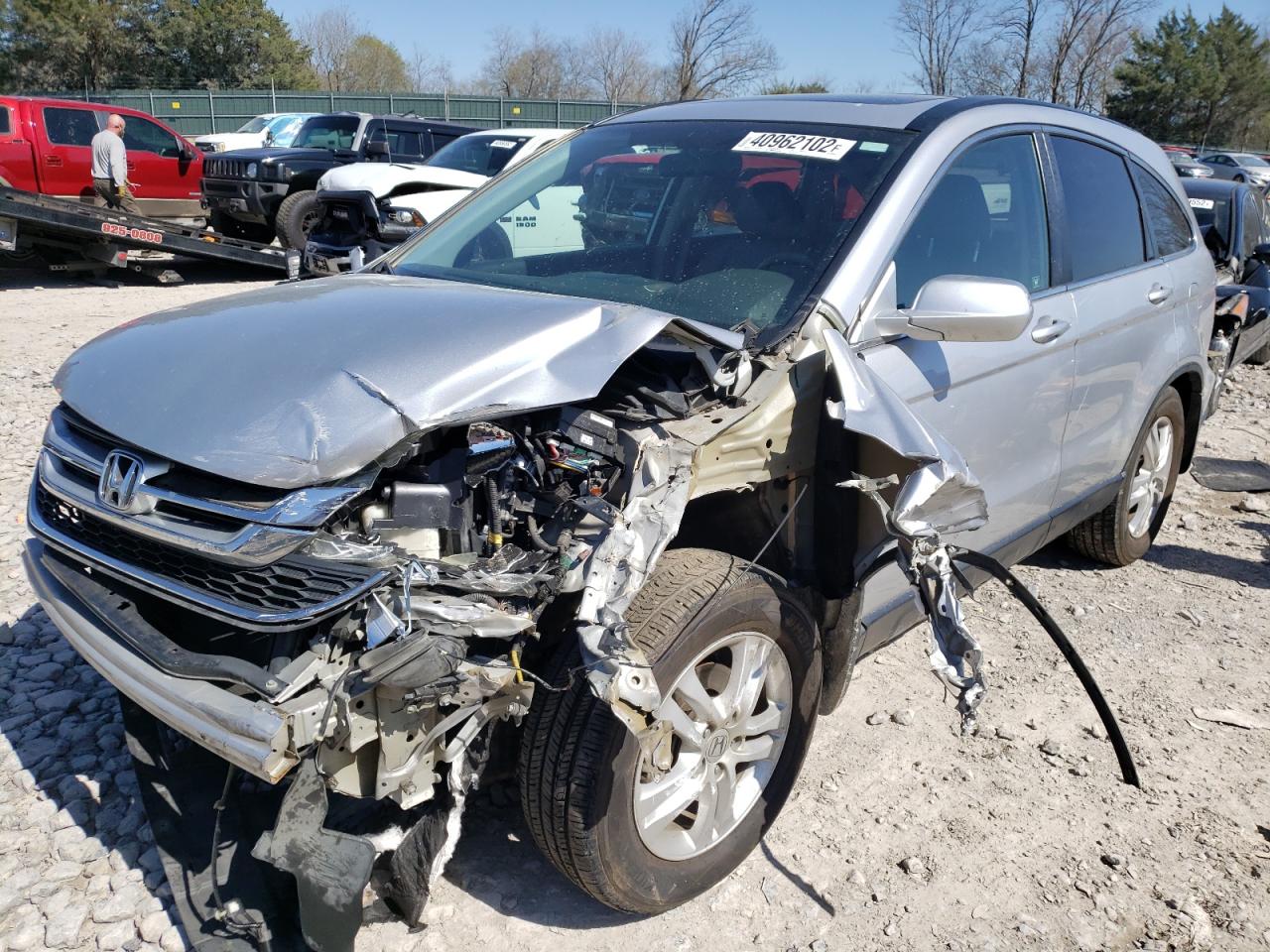 Photo 2 from auction – 2011 HONDA CR-V EXL with VIN 5J6RE4H74BL034178