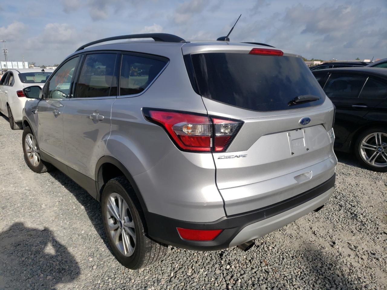 Photo 3 from auction – 2018 FORD ESCAPE SE with VIN 1FMCU9GD2JUC99379