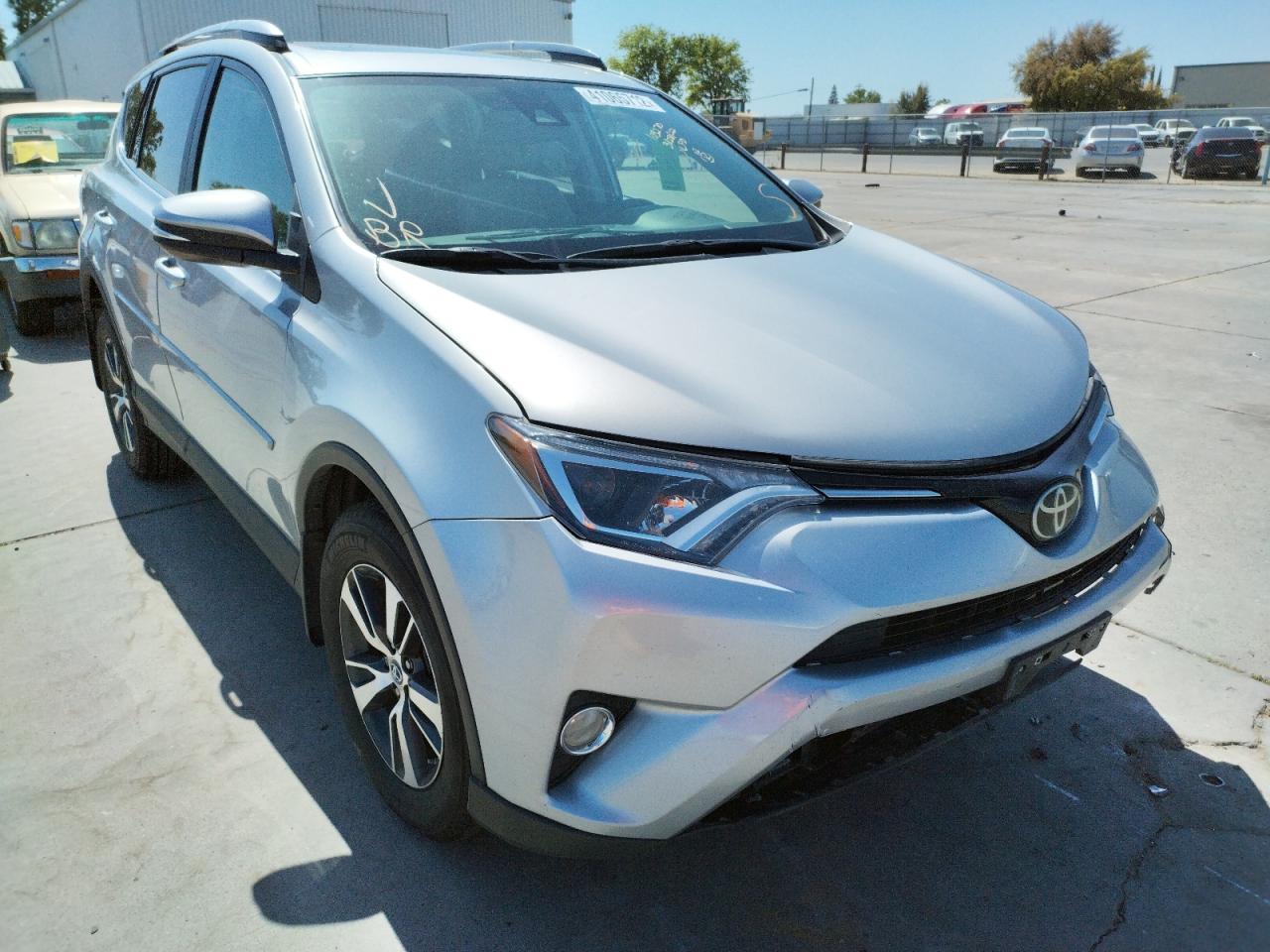 TOYOTA RAV4 XLE 2017 with VIN 2T3RFREV0HW549929 - Photo from auction