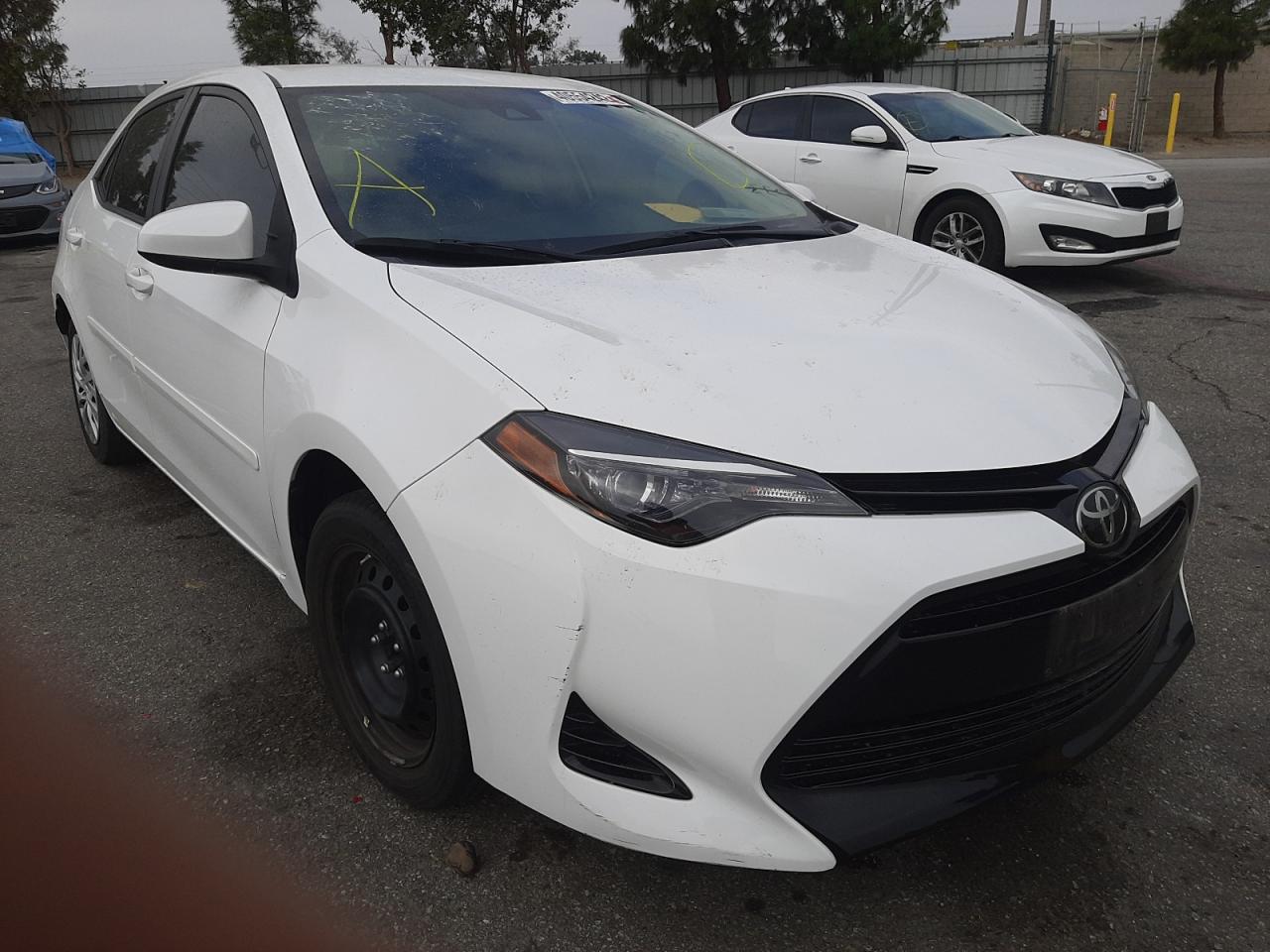 TOYOTA COROLLA L 2017 with VIN 5YFBURHE0HP672837 - Photo from auction