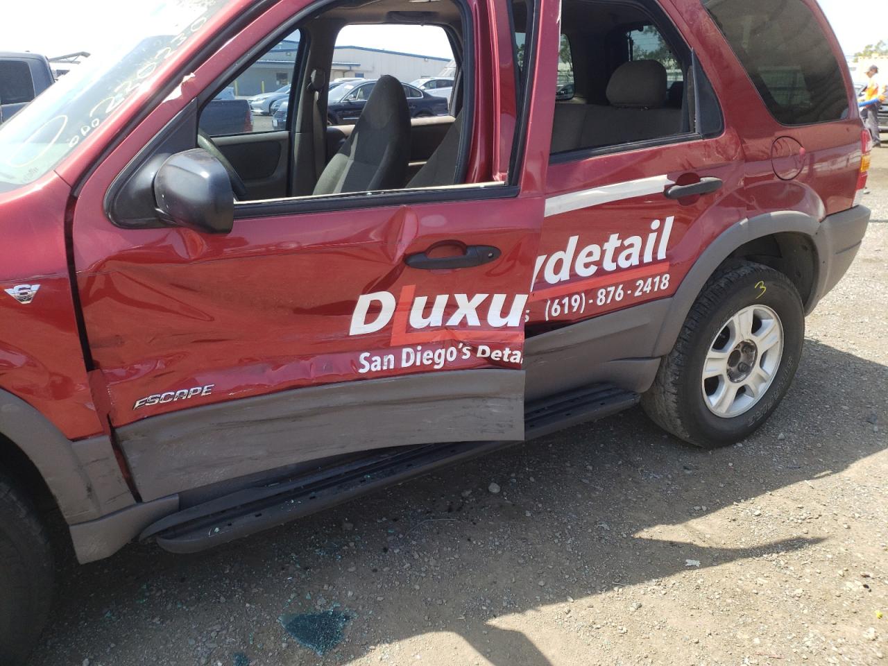 Photo 9 from auction – 2001 FORD ESCAPE XLT with VIN 1FMYU03171KD91239