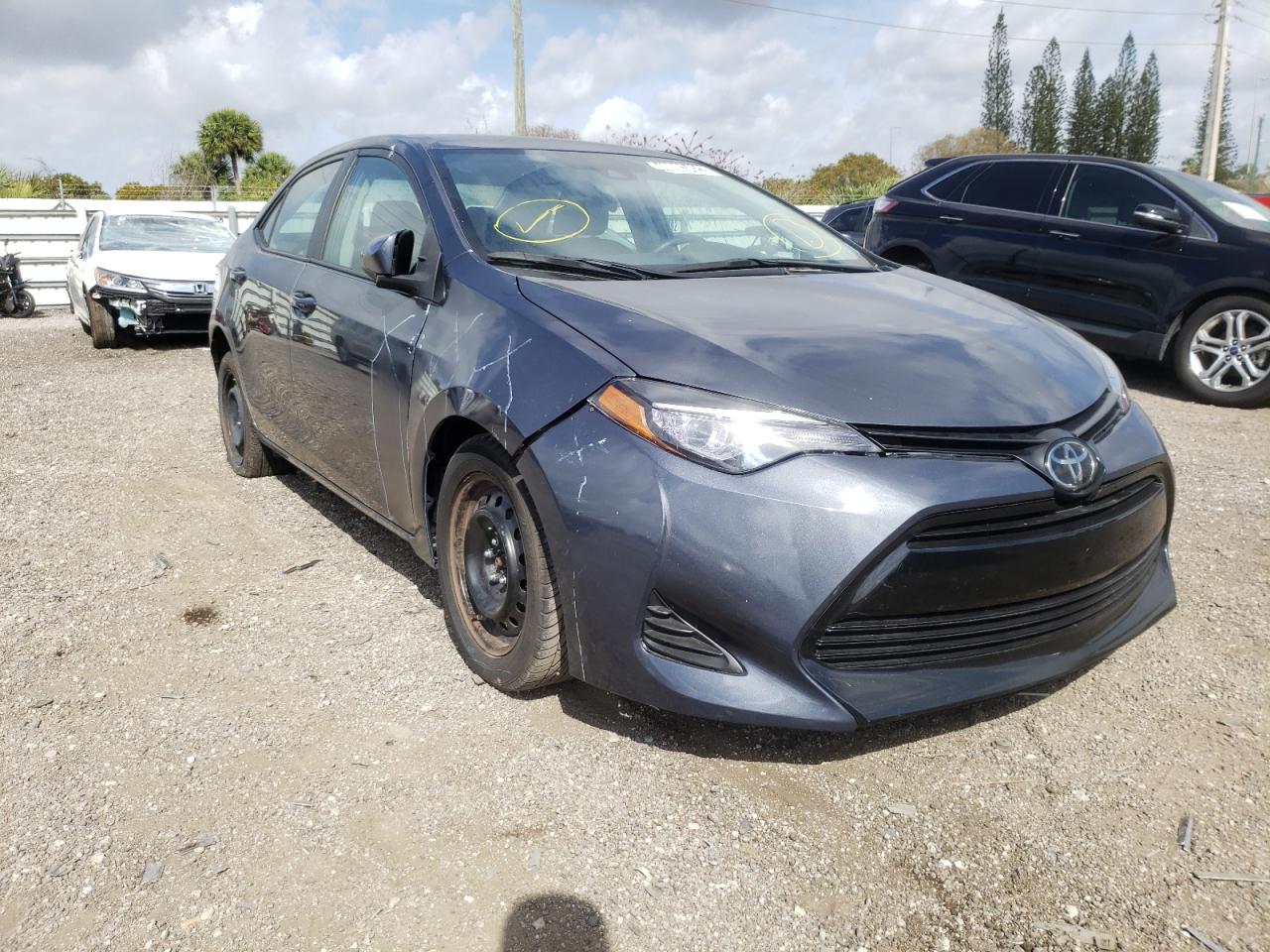 TOYOTA COROLLA L 2019 with VIN 2T1BURHE5KC243216 - Photo from auction