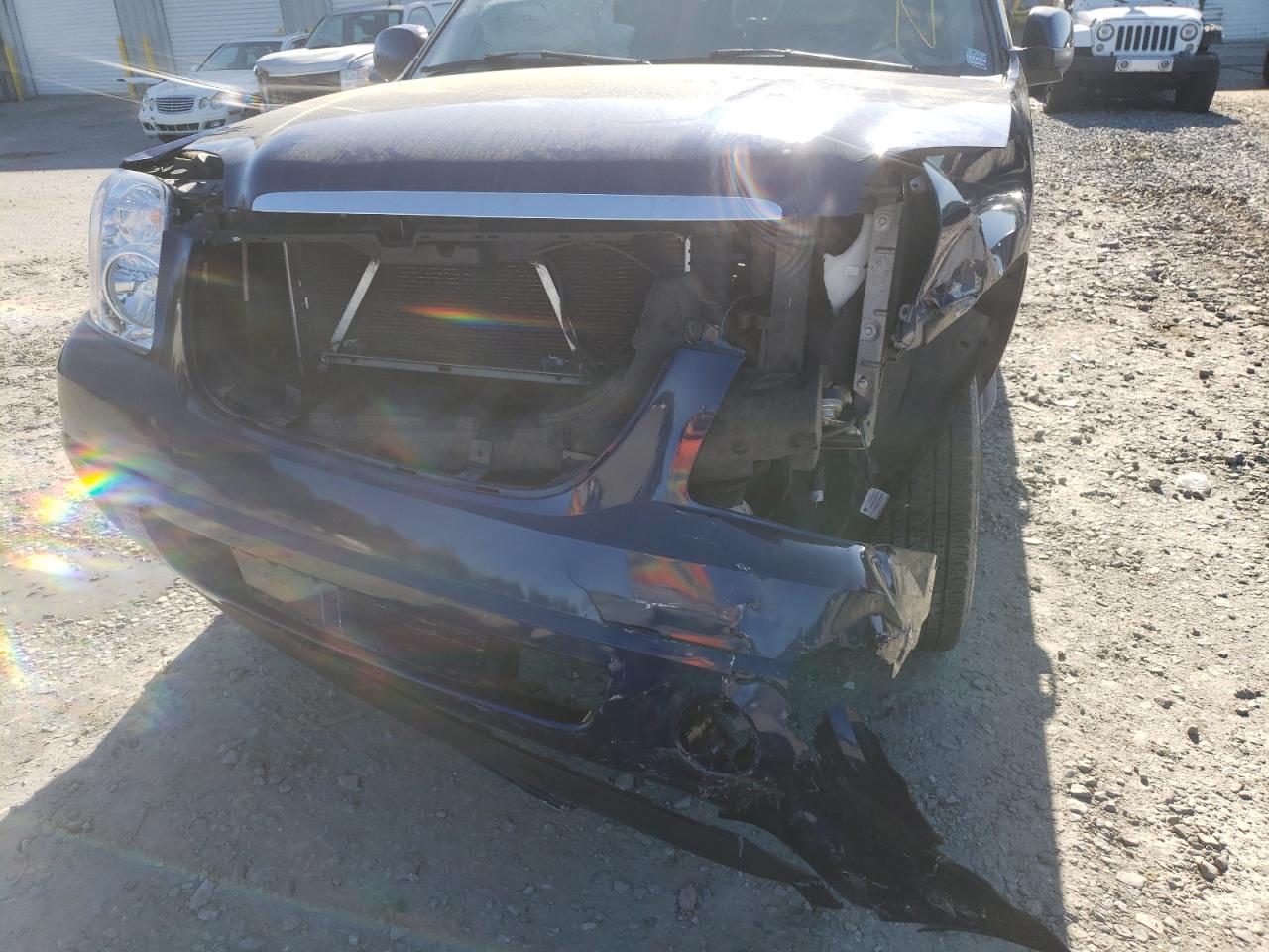Photo 9 from auction – 2007 GMC YUKON with VIN 1GKFC13J97J128046