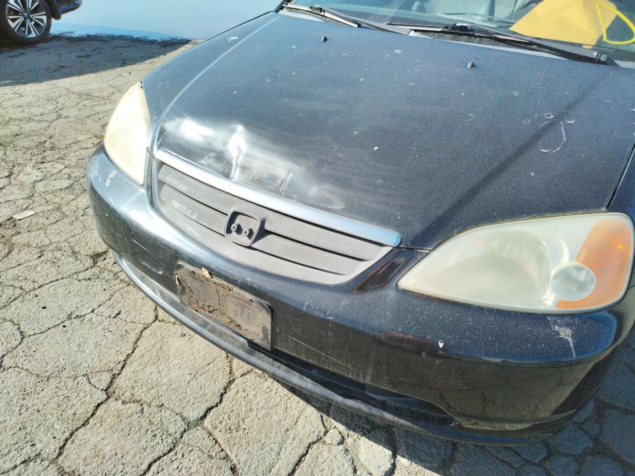 Photo 9 from auction – 2001 HONDA CIVIC LX with VIN 2HGES16571H611862
