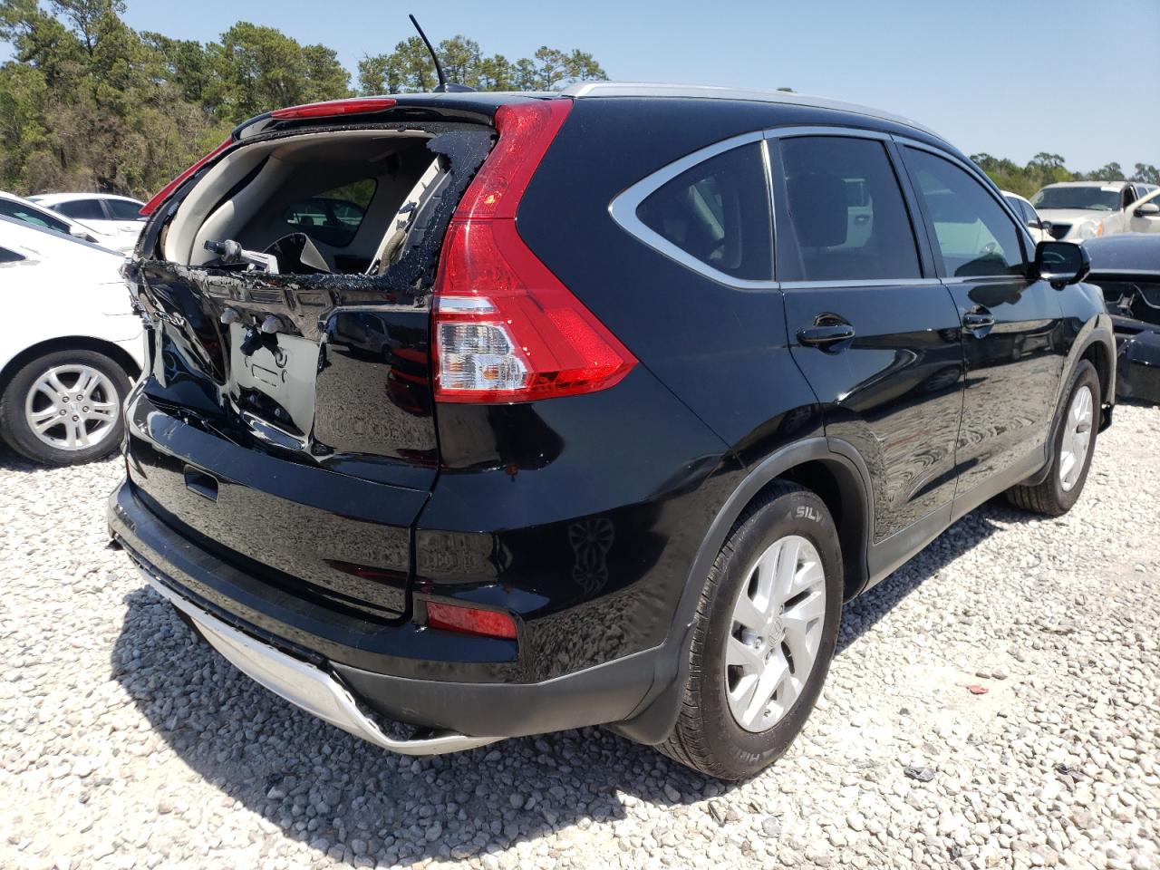 Photo 4 from auction – 2015 HONDA CR-V EXL with VIN 2HKRM3H79FH515380