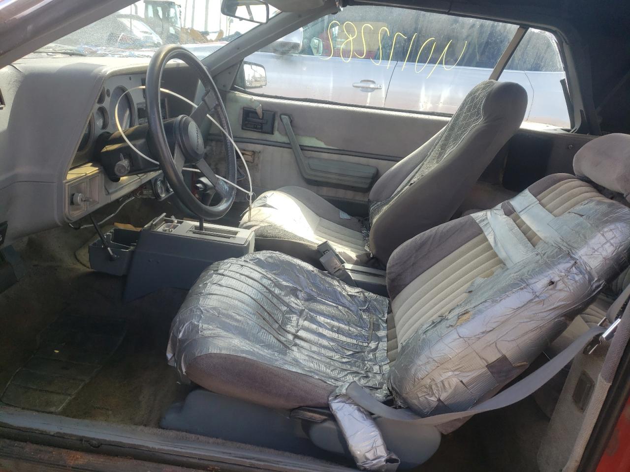 Photo 5 from auction – 1985 PONTIAC SUNBIRD LE with VIN 1G2JC6702F7536182