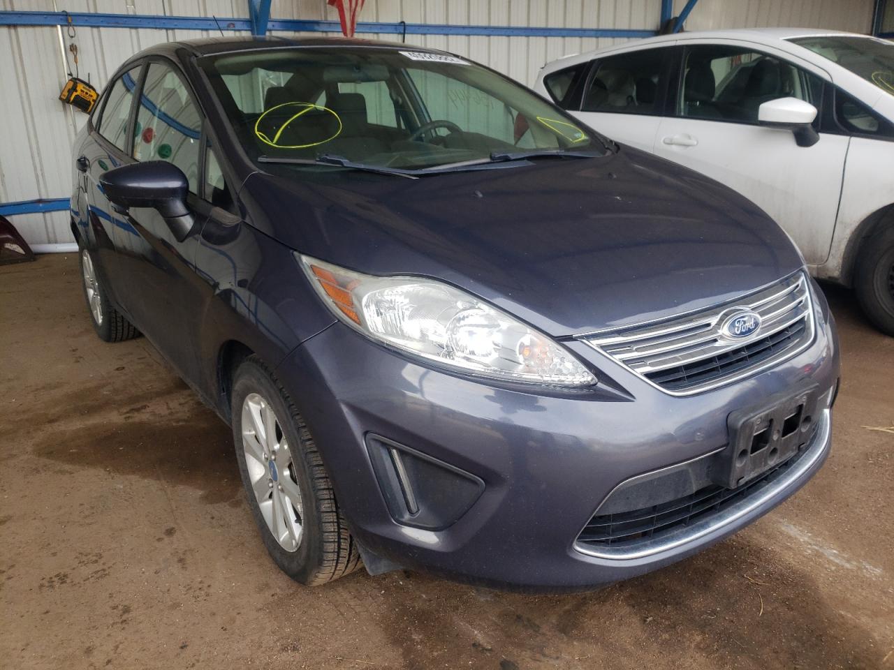 FORD FIESTA SE 2012 with VIN 3FADP4BJ7CM140693 - Photo from auction