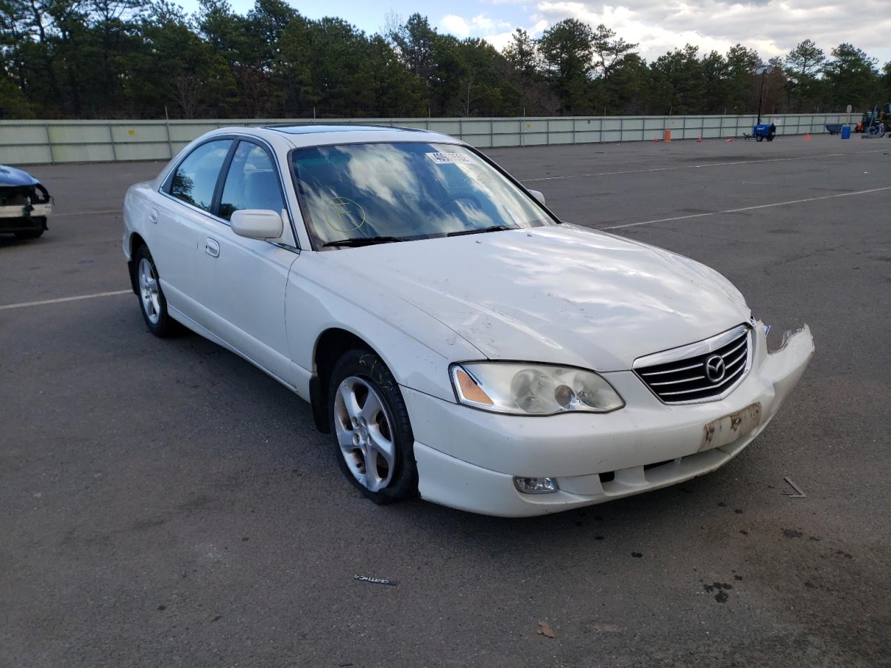 MAZDA MILLENIA 2001 with VIN JM1TA221911703734 - Photo from auction