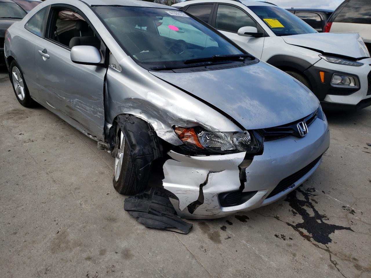 Photo 9 from auction – 2006 HONDA CIVIC LX with VIN 2HGFG11656H511384
