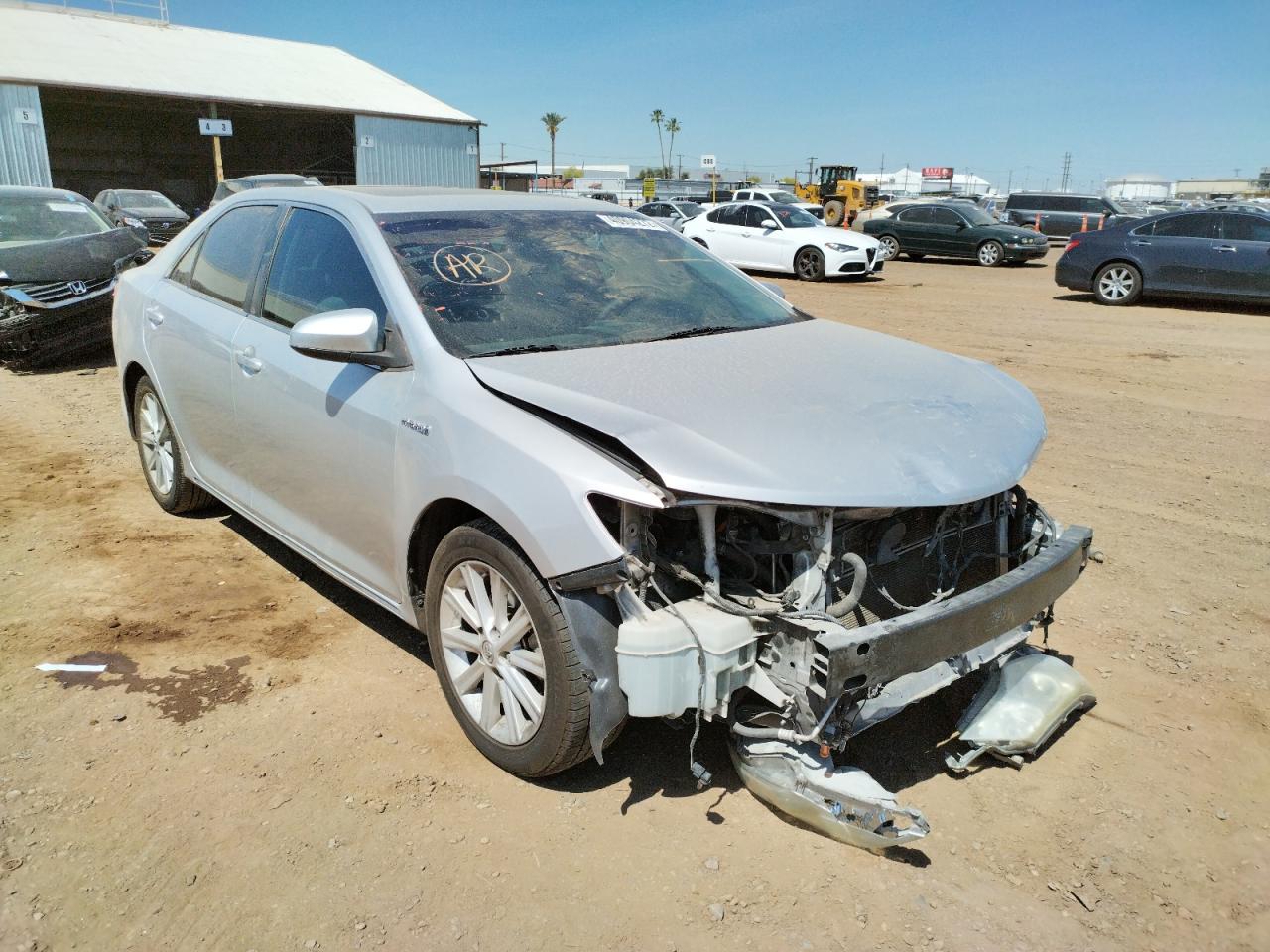 TOYOTA CAMRY HYBR 2013 with VIN 4T1BD1FK2DU074297 - Photo from auction