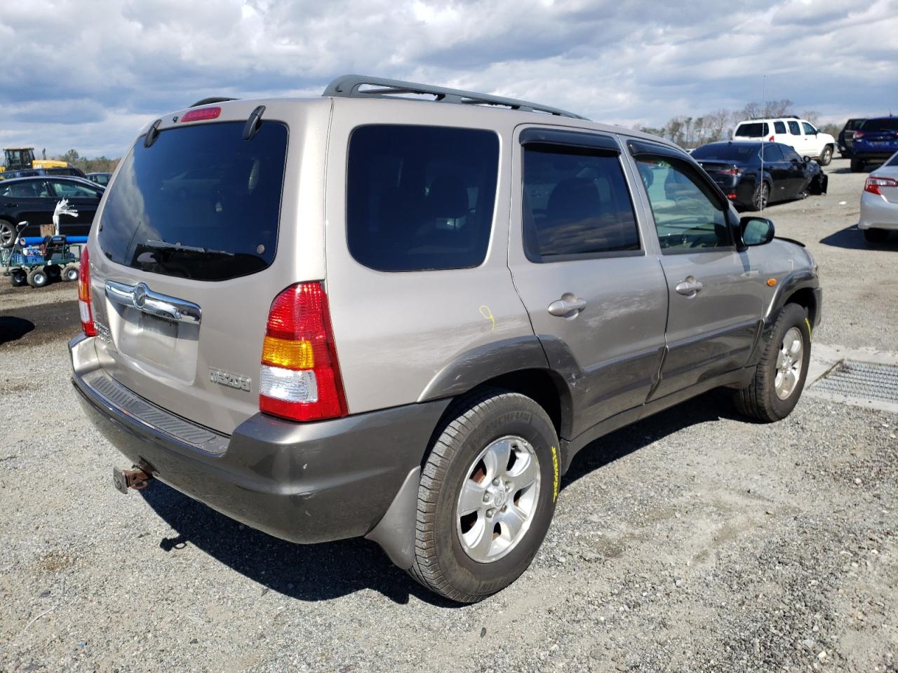 Photo 4 from auction – 2002 MAZDA TRIBUTE LX with VIN 4F2CU08182KM10051