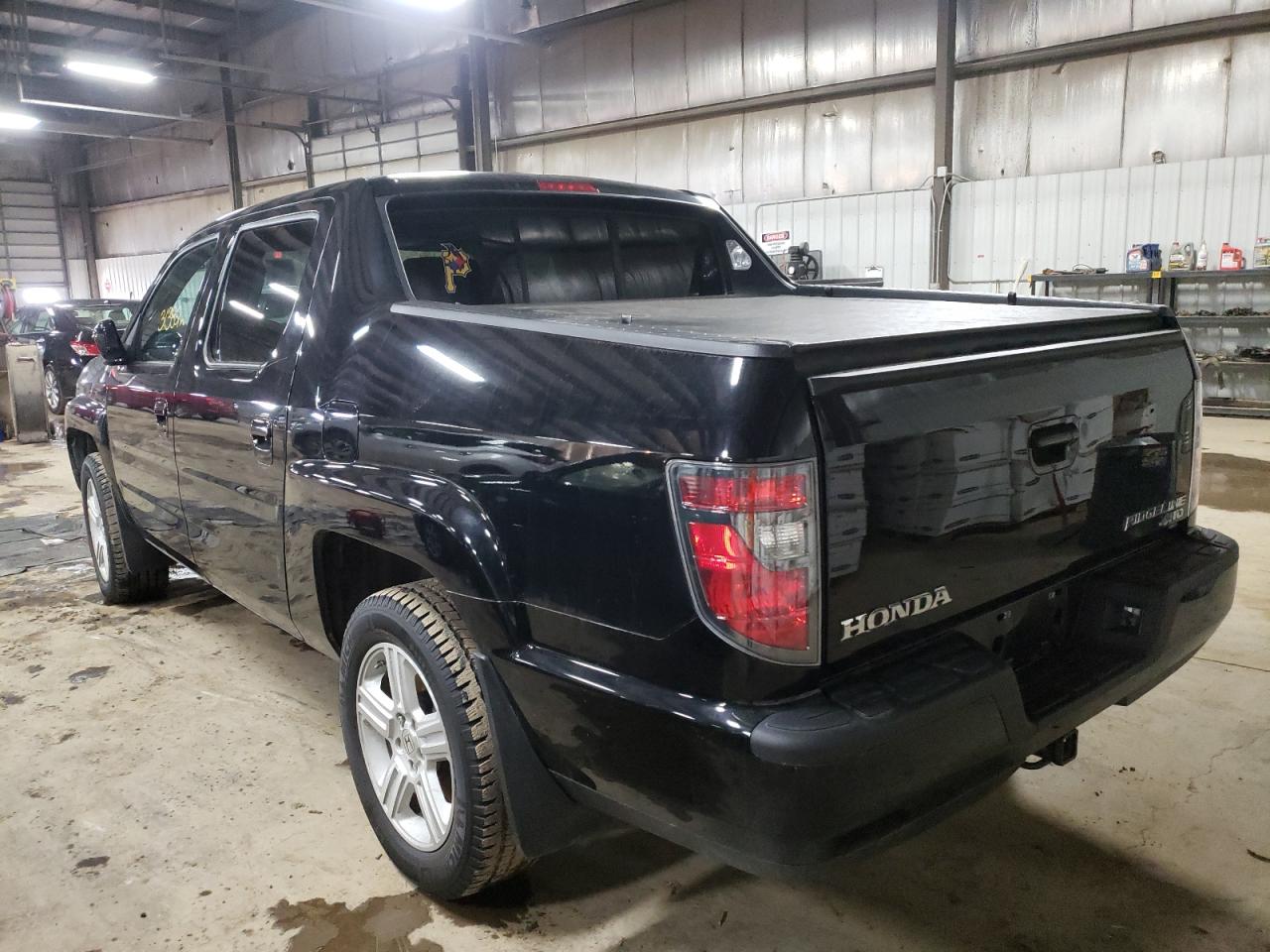 Photo 3 from auction – 2013 HONDA RIDGELINE with VIN 5FPYK1F58DB005547