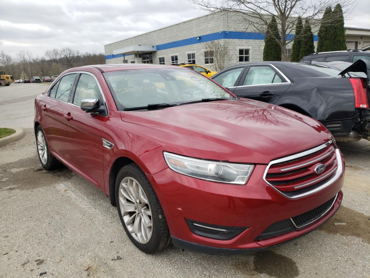 FORD TAURUS 2014 with VIN 1FAHP2F84EG136689 - Photo from auction