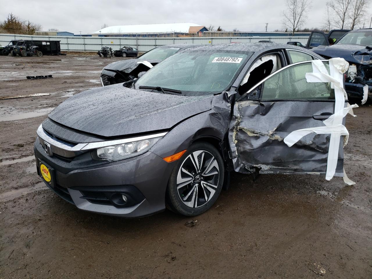 Photo 2 from auction – 2018 HONDA CIVIC EX with VIN JHMFC1F37JX029320