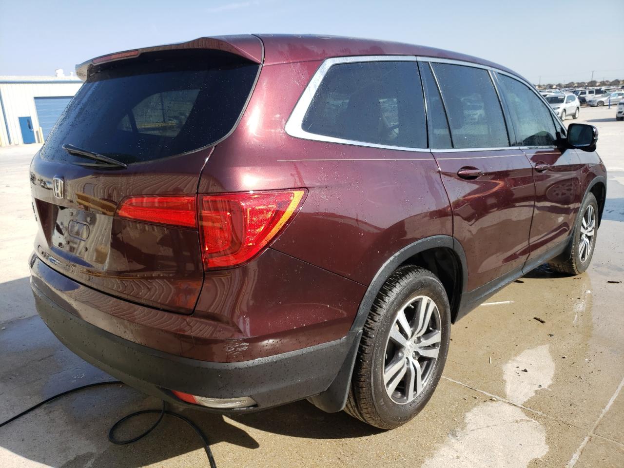 Photo 4 from auction – 2016 HONDA PILOT EXLN with VIN 5FNYF5H76GB022631