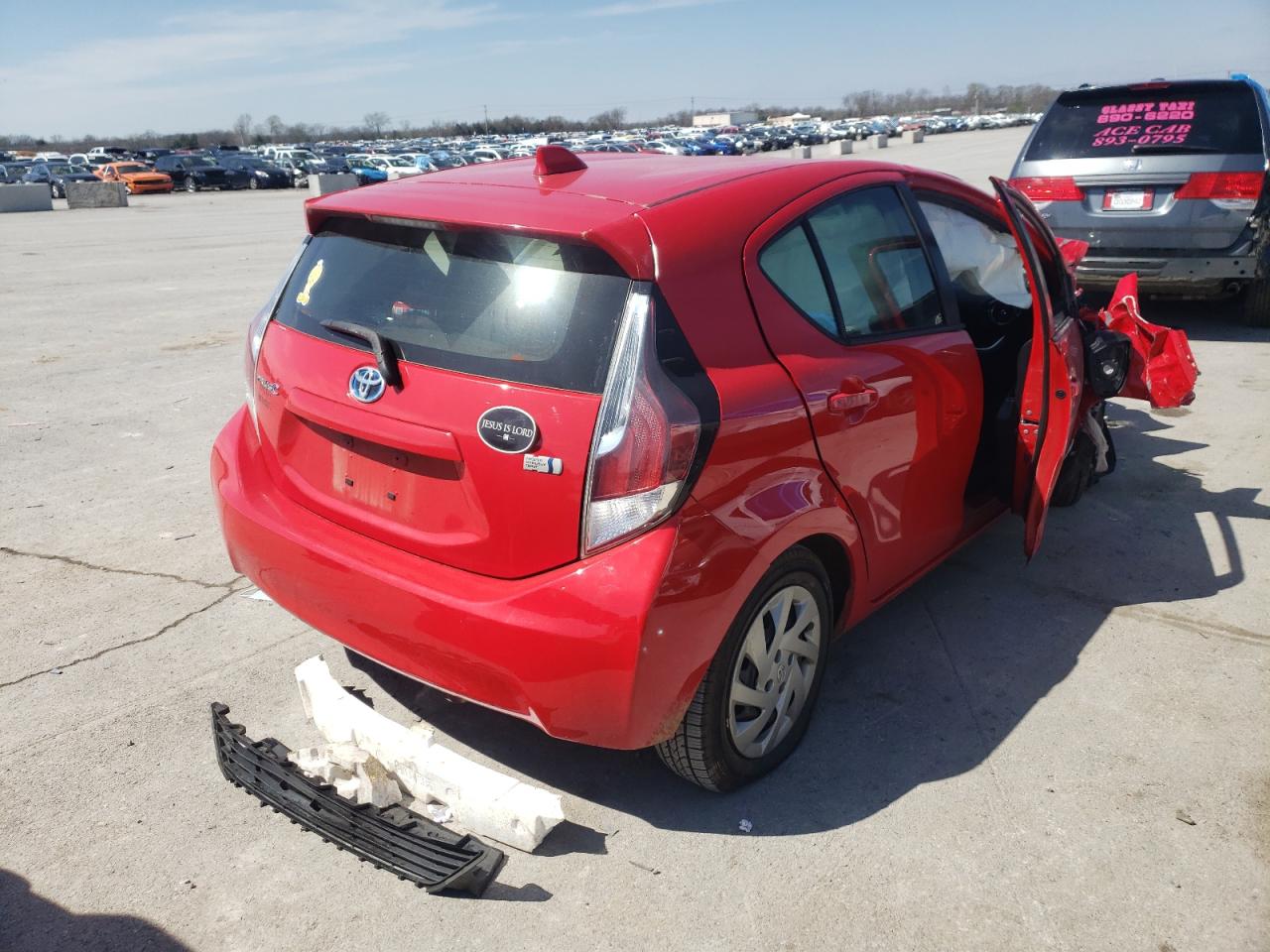 Photo 4 from auction – 2015 TOYOTA PRIUS C with VIN JTDKDTB32F1111755