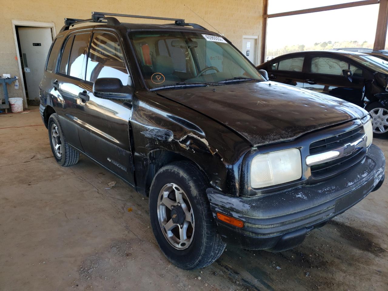 CHEVROLET TRACKER 1999 with VIN 2CNBE13C0X6923324 - Photo from auction