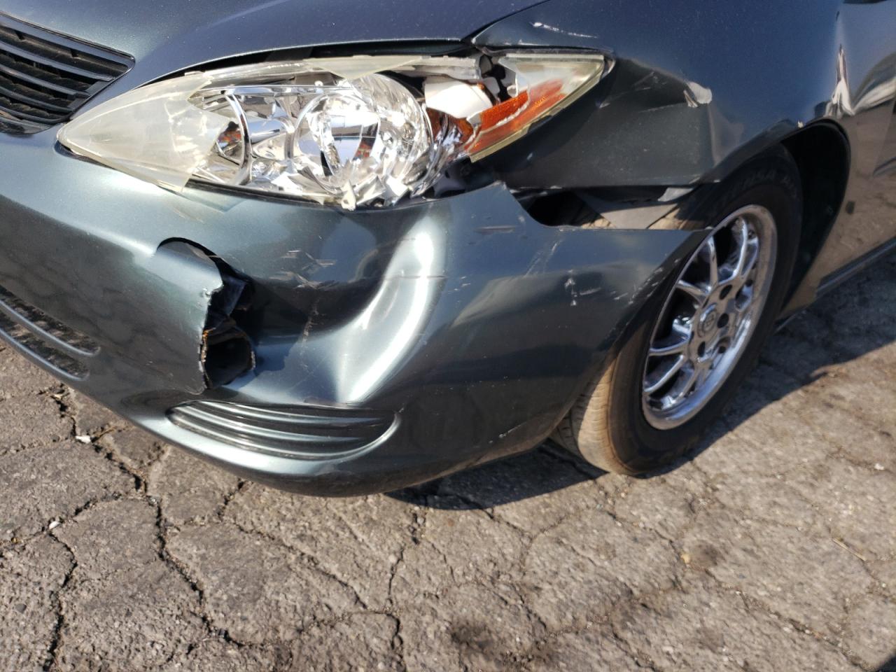 Photo 9 from auction – 2002 TOYOTA CAMRY LE with VIN 4T1BF30K72U500819