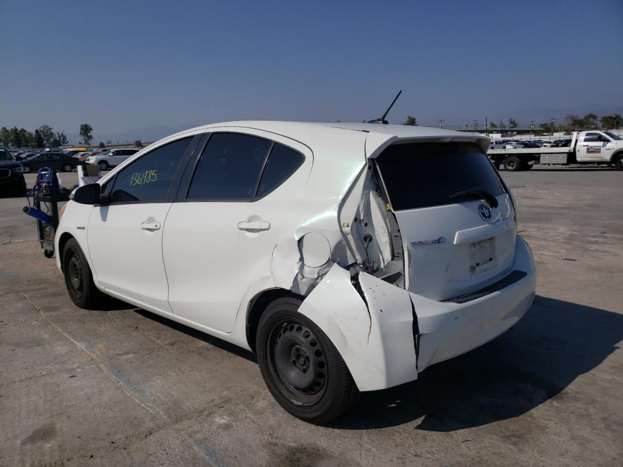 Photo 3 from auction – 2014 TOYOTA PRIUS C with VIN JTDKDTB3XE1069544