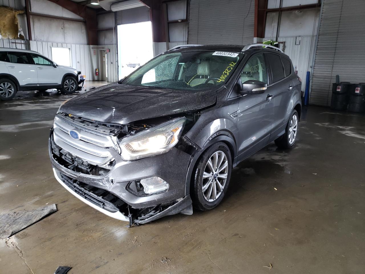 Photo 2 from auction – 2017 FORD ESCAPE TIT with VIN 1FMCU0JD6HUC92501