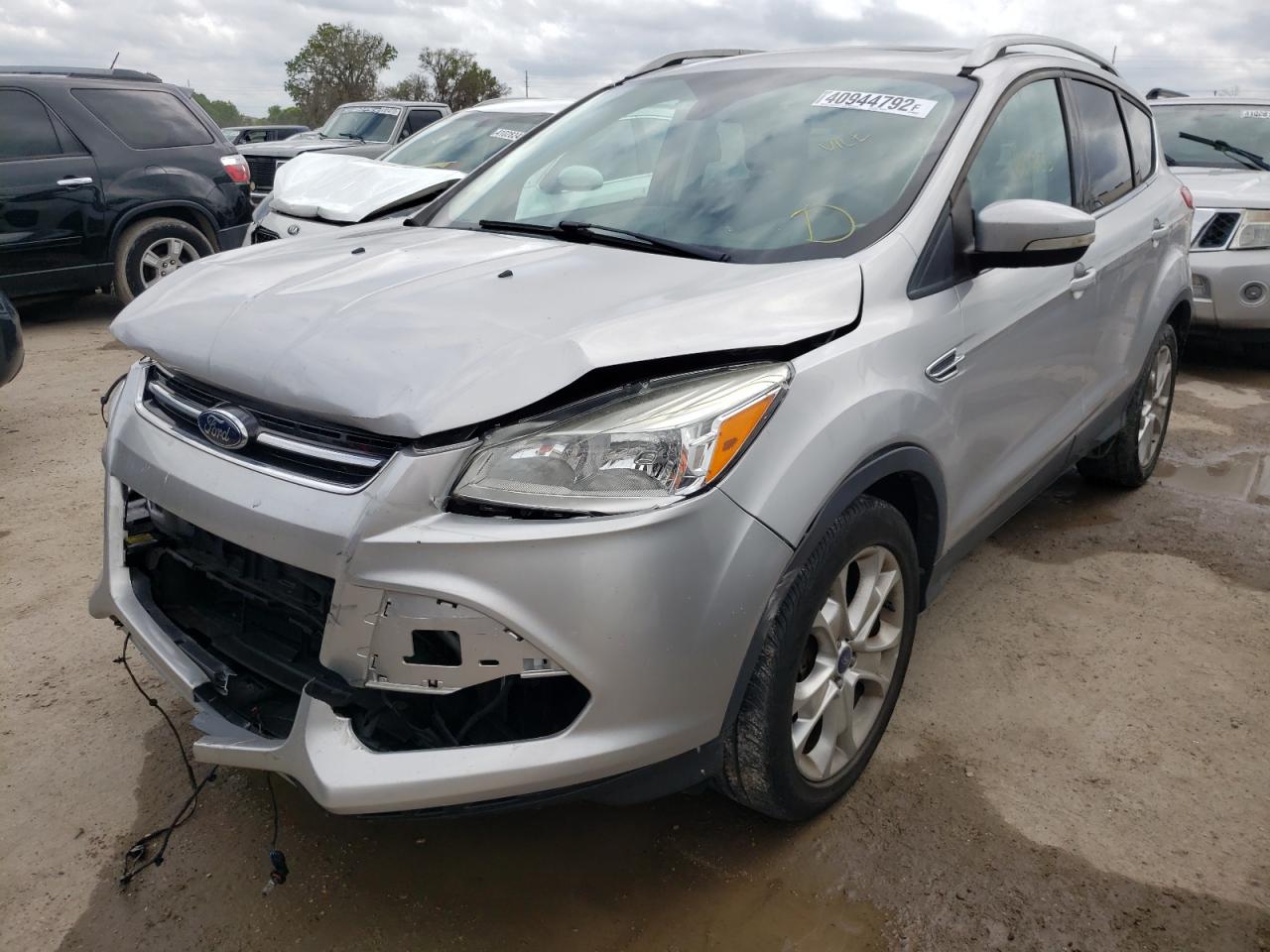 Photo 2 from auction – 2014 FORD ESCAPE TIT with VIN 1FMCU9JX5EUA09791