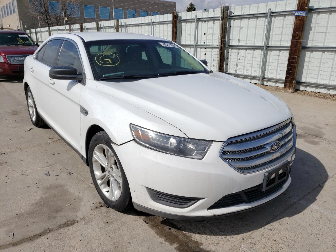 FORD TAURUS SE 2015 with VIN 1FAHP2D89FG145800 - Photo from auction