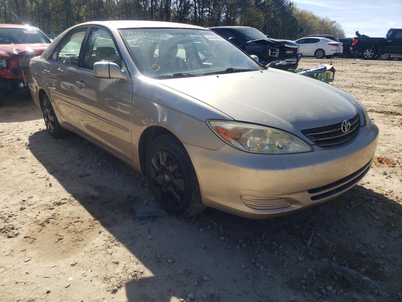 TOYOTA CAMRY LE 2003 with VIN 4T1BE32K53U657170 - Photo from auction