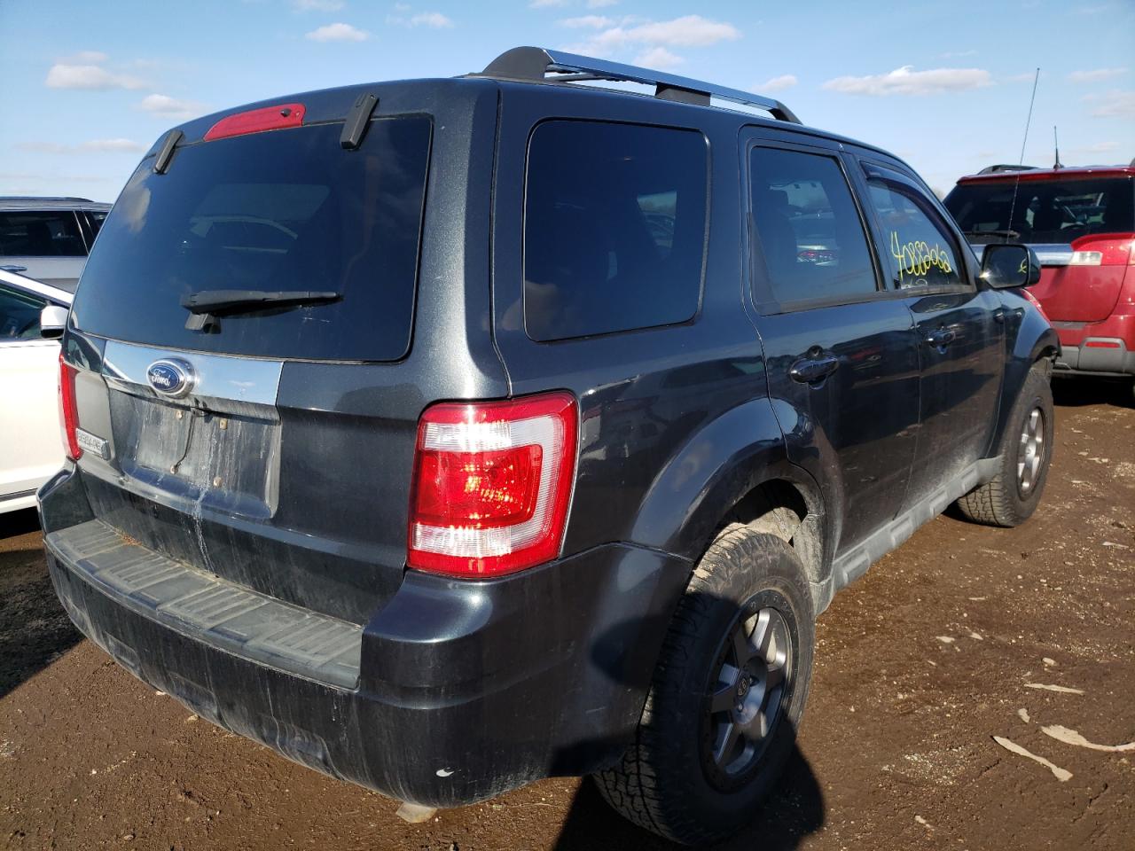 Photo 4 from auction – 2009 FORD ESCAPE LIM with VIN 1FMCU04799KC11543