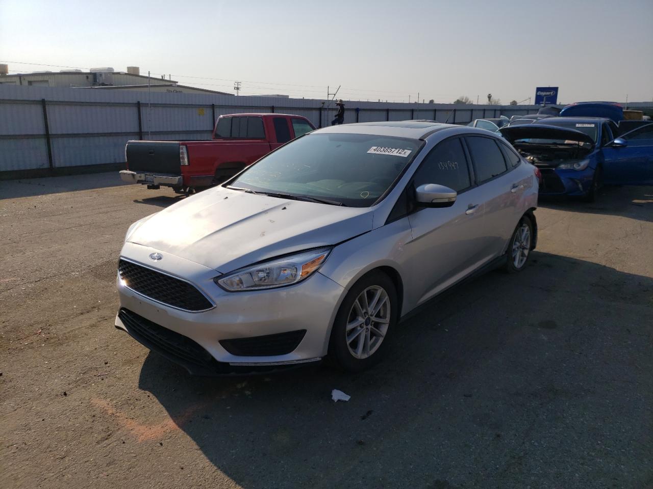 Photo 2 from auction – 2016 FORD FOCUS SE with VIN 1FADP3F20GL270528