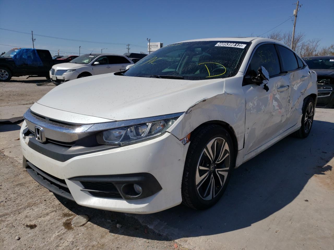 Photo 2 from auction – 2016 HONDA CIVIC EXL with VIN 19XFC1F72GE007528