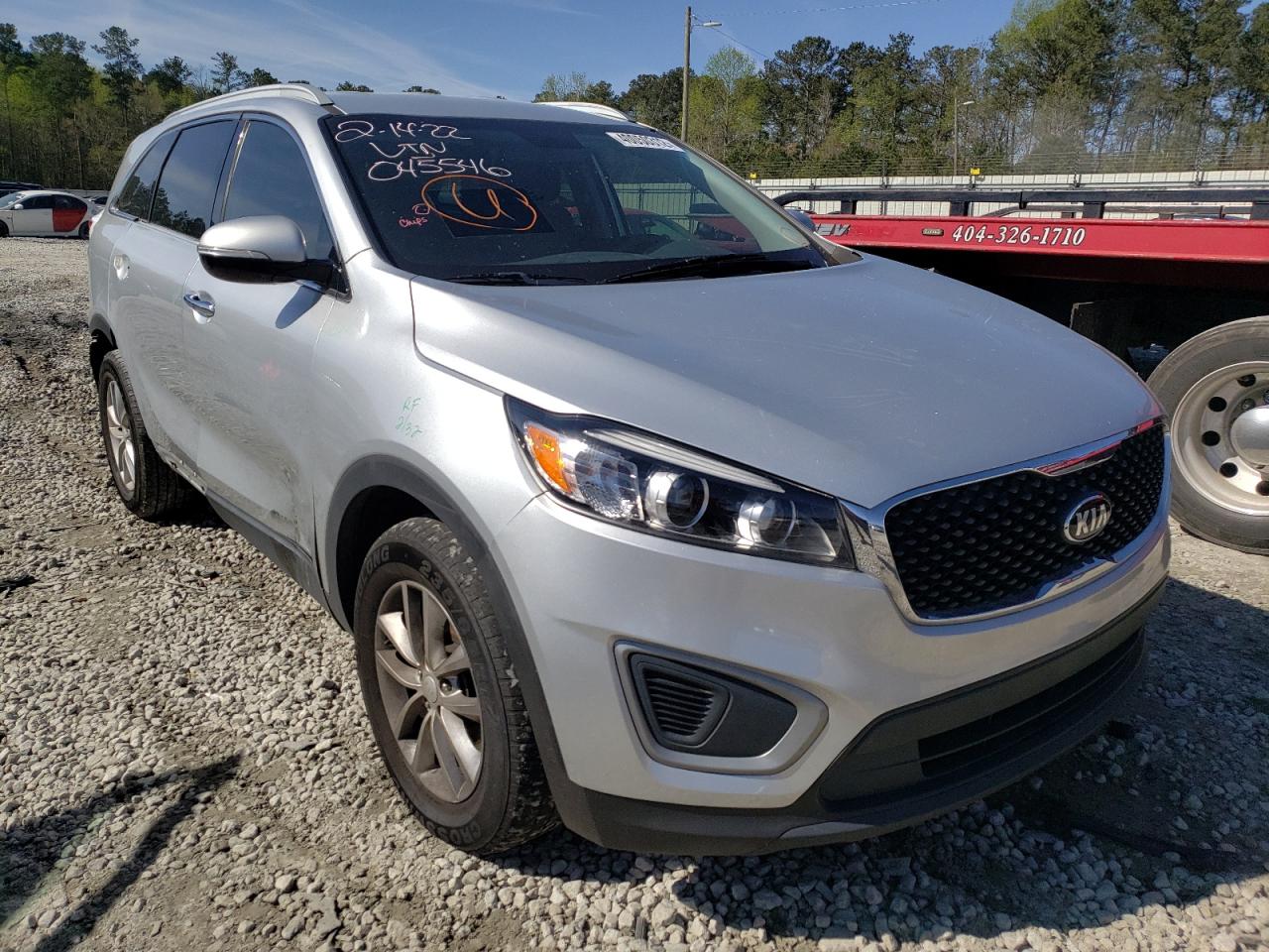 KIA SORENTO LX 2016 with VIN 5XYPG4A35GG045546 - Photo from auction