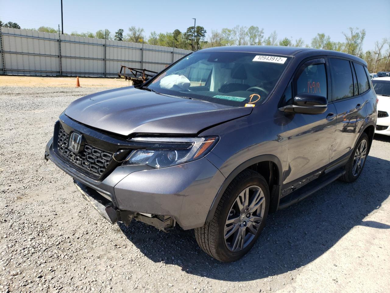Photo 2 from auction – 2021 HONDA PASSPORT E with VIN 5FNYF8H53MB005216