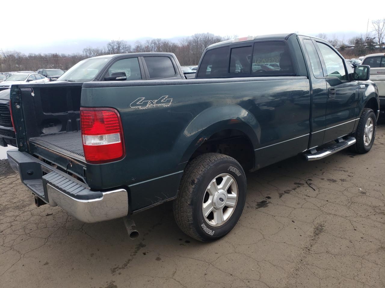 Photo 4 from auction – 2004 FORD F150 with VIN 1FTRF14W24NA71235