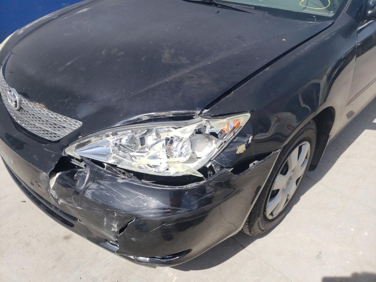 Photo 9 from auction – 2003 TOYOTA CAMRY LE with VIN 4T1BE32K13U229712