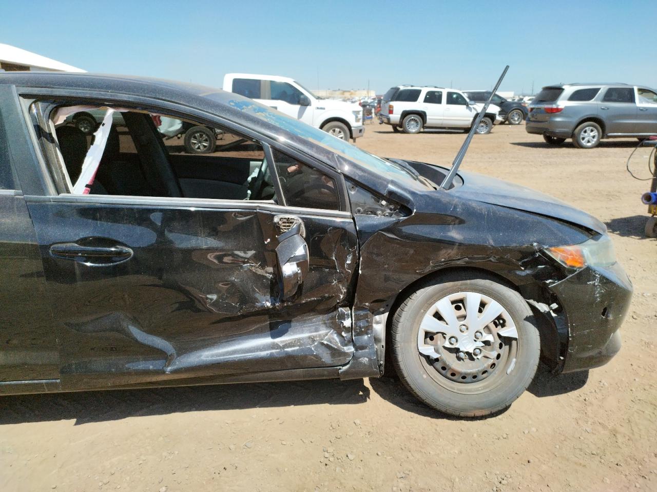 Photo 9 from auction – 2012 HONDA CIVIC LX with VIN 19XFB2F5XCE335443