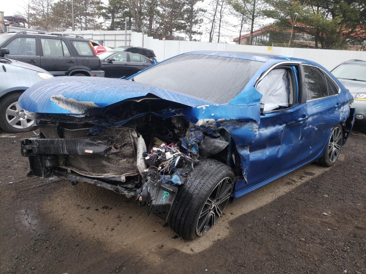 Photo 2 from auction – 2016 TOYOTA CAMRY LE with VIN 4T1BF1FK7GU999057