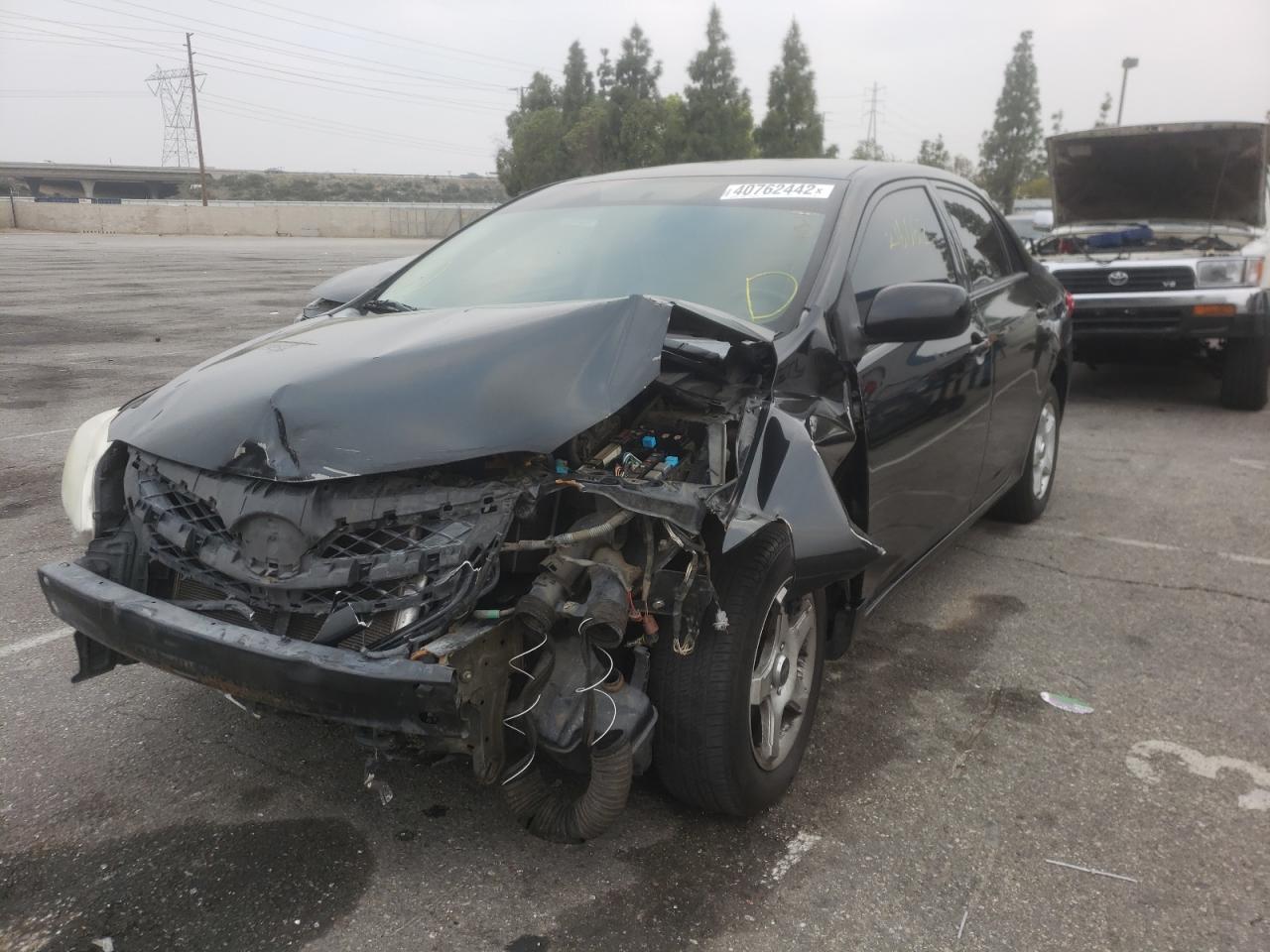 Photo 2 from auction – 2013 TOYOTA COROLLA 2D with VIN 5YFBU4EE8DP100559