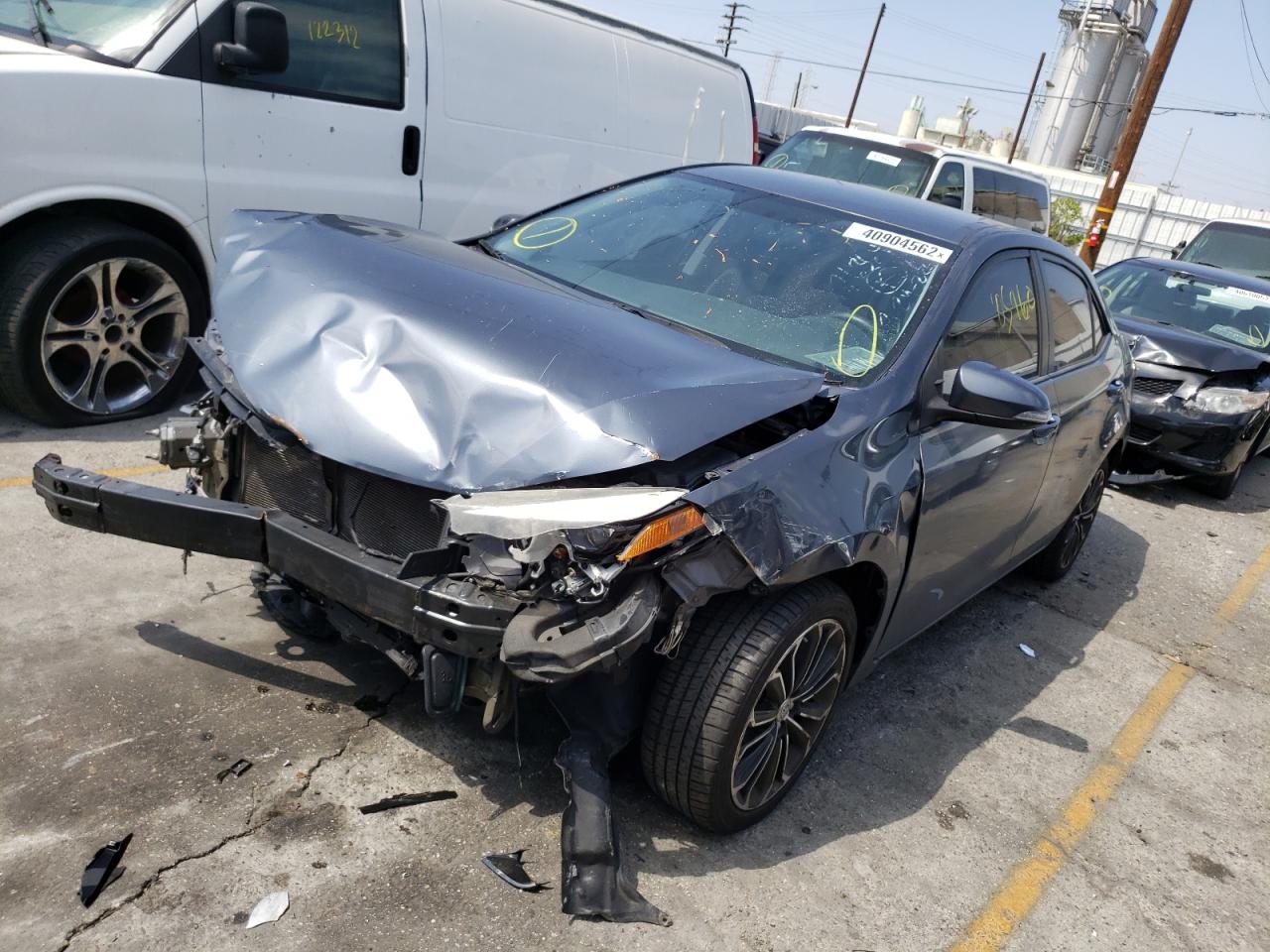 Photo 2 from auction – 2014 TOYOTA COROLLA L with VIN 5YFBURHE5EP174855