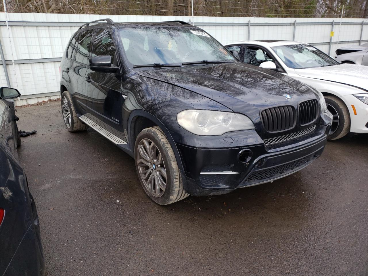 BMW X5 XDRIVE3 2012 with VIN 5UXZV4C50CL766335 - Photo from auction