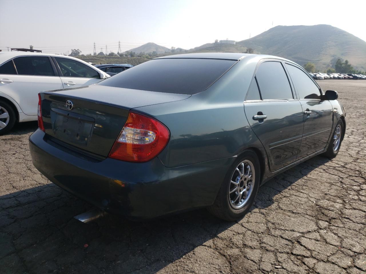 Photo 4 from auction – 2002 TOYOTA CAMRY LE with VIN 4T1BF30K72U500819