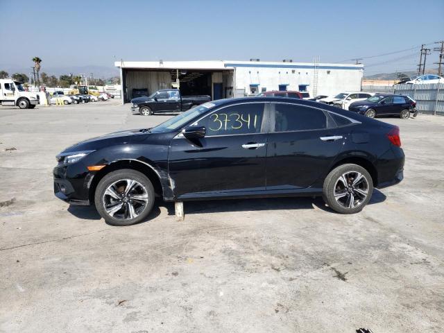 Photo 9 from auction – 2017 HONDA CIVIC TOUR with VIN 19XFC1F91HE009550